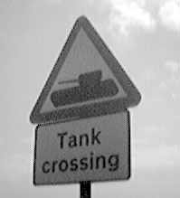 Tank crossing road sign