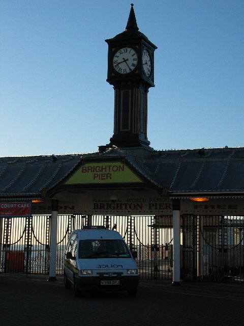 Pier clock and police car