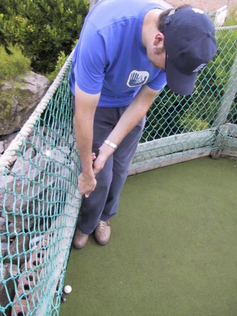 Paul shows off his golfing skills