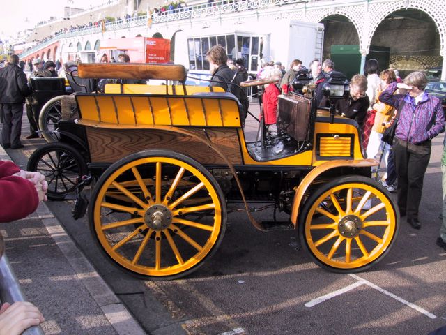 A smart yellow car