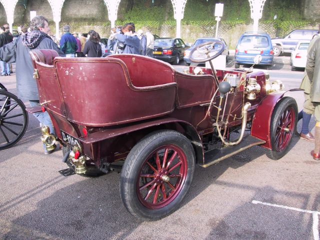 A maroon car